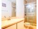 Well-lit bathroom with a glass-enclosed shower and modern fixtures at 1907 Fluorshire Dr, Brandon, FL 33511