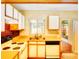 Efficient kitchen layout with a double sink and plenty of cabinet space at 1907 Fluorshire Dr, Brandon, FL 33511