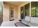 Enjoy relaxing on the screened lanai with outdoor seating and easy access to the backyard at 19418 Butterwood Ln, Lutz, FL 33558