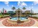 A decorative fountain serves as a focal point in this community, surrounded by well-maintained landscaping at 21284 Southern Charm Dr, Land O Lakes, FL 34637