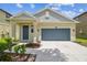 Inviting single-Gathering home with a well-manicured lawn and a two-car garage at 21284 Southern Charm Dr, Land O Lakes, FL 34637