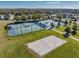 Community sports courts with tennis, basketball, and sand volleyball at 21284 Southern Charm Dr, Land O Lakes, FL 34637