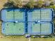 Aerial view of community tennis and basketball courts at 21284 Southern Charm Dr, Land O Lakes, FL 34637
