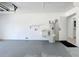 Garage with water heater and utility sink at 21426 Quesada Ave, Port Charlotte, FL 33952