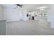 Spacious and bright living room seamlessly connecting to a modern kitchen, perfect for entertaining at 21426 Quesada Ave, Port Charlotte, FL 33952