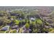 A picturesque aerial view of the property, nestled among lush trees at 221 S Kingsway Rd, Seffner, FL 33584