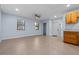 Spacious room featuring tiled floors and a ceiling fan for added comfort at 221 S Kingsway Rd, Seffner, FL 33584