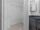 Walk-in closet with built-in shelves for optimal storage and organization at 221 S Kingsway Rd, Seffner, FL 33584