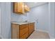 Functional wet bar equipped with wooden cabinets and ample counter space at 221 S Kingsway Rd, Seffner, FL 33584