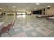 A large auditorium with an empty stage at 2253 Norwegian Dr # 27, Clearwater, FL 33763