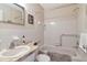 Bathroom showcasing a well-lit vanity and a shower/tub combo with accessibility features at 2253 Norwegian Dr # 27, Clearwater, FL 33763