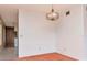 Elegant dining room with a stylish chandelier and neutral tones, ideal for creating memorable dining experiences at 2253 Norwegian Dr # 27, Clearwater, FL 33763