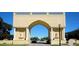 A gated entrance with an arched roof and statues at 2253 Norwegian Dr # 27, Clearwater, FL 33763