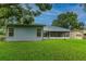 Expansive backyard view, showcasing a well-maintained lawn at 22946 Brownwood Ct, Land O Lakes, FL 34639