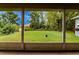 View of the backyard from the screened-in lanai at 22946 Brownwood Ct, Land O Lakes, FL 34639