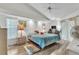 Comfortable bedroom with vaulted ceiling, slider door and bright natural light at 22946 Brownwood Ct, Land O Lakes, FL 34639