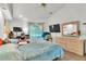 Primary bedroom with ample closet space, vaulted ceiling and sliding door at 22946 Brownwood Ct, Land O Lakes, FL 34639