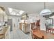Spacious kitchen featuring ample cabinetry, skylight, and open layout at 22946 Brownwood Ct, Land O Lakes, FL 34639