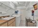Laundry room with sink and storage, and washer and dryer at 22946 Brownwood Ct, Land O Lakes, FL 34639