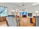 Spacious living room with hardwood flooring, fireplace, and built-in shelves at 22946 Brownwood Ct, Land O Lakes, FL 34639