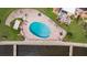 Aerial view of community pool, outdoor lounge areas, boat docks, and waterfront at 2424 W Tampa Bay Blvd # G204, Tampa, FL 33607