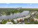 Stunning aerial view of waterfront condos with private boat docks and a scenic cityscape backdrop at 2424 W Tampa Bay Blvd # G204, Tampa, FL 33607