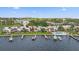 Waterfront condos featuring private boat docks, manicured lawns, and a community pool at 2424 W Tampa Bay Blvd # G204, Tampa, FL 33607
