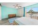 Spacious bedroom featuring a king bed, drawers, and private balcony access at 2424 W Tampa Bay Blvd # G204, Tampa, FL 33607