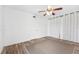 Bedroom with wood-look floors and ceiling fan at 2424 W Tampa Bay Blvd # G204, Tampa, FL 33607