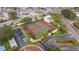 Overhead shot of community tennis courts, with parking and the gated entry visible at 2424 W Tampa Bay Blvd # G204, Tampa, FL 33607