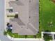Aerial view showcases a well-maintained townhome community with lush green spaces at 2432 Golden Pasture Cir, Clearwater, FL 33764