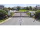 View of the gated entrance to the community, providing security and privacy for residents at 2432 Golden Pasture Cir, Clearwater, FL 33764