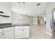Open concept kitchen and living room layout at 2432 Golden Pasture Cir, Clearwater, FL 33764