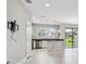 Modern kitchen featuring stainless steel appliances and a breakfast bar at 2432 Golden Pasture Cir, Clearwater, FL 33764