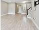 Bright living room featuring modern flooring and an open layout at 2432 Golden Pasture Cir, Clearwater, FL 33764