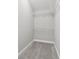 The walk-in closet with wire shelving maximizes storage options at 2432 Golden Pasture Cir, Clearwater, FL 33764