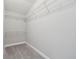 This walk-in closet is equipped with wire shelving for ample storage at 2432 Golden Pasture Cir, Clearwater, FL 33764