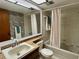 Full bathroom with tub and shower combination, classic fixtures, and ample storage at 2541 Laurelwood Dr # 8C, Clearwater, FL 33763