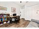 Office with hardwood floors, desk, and closet at 26 Concord Dr, Dunedin, FL 34698