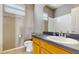 Bathroom featuring a single sink vanity and a standard toilet at 2728 Abbey Grove Dr, Valrico, FL 33594
