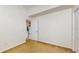 Bedroom featuring neutral carpet and a door leading to another room at 2728 Abbey Grove Dr, Valrico, FL 33594