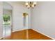 Elegant dining room featuring wood floors, an open layout, and plenty of natural light at 2728 Abbey Grove Dr, Valrico, FL 33594