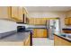Well-equipped kitchen with modern appliances, ample cabinet space, and sleek countertops at 2728 Abbey Grove Dr, Valrico, FL 33594