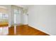 Bright living room features hardwood floors, high ceilings, and natural light at 2728 Abbey Grove Dr, Valrico, FL 33594
