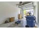 Spacious garage with open door, showing storage space and natural light at 2801 Midnight Pearl Dr, Sarasota, FL 34240