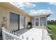 Concrete back patio includes grill and fenced-in yard at 3401 Pinon Dr, Holiday, FL 34691