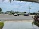 Community clubhouse featuring ample parking, pristine landscaping, and inviting common areas at 34091 Alamanda N Dr, Pinellas Park, FL 33781