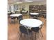 Spacious library featuring tables with chairs, a large bookshelf, and bright lighting to create a comfortable space at 34091 Alamanda N Dr, Pinellas Park, FL 33781