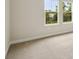 Cozy bedroom with plush carpet and dual windows offering scenic views at 3448 Yellow Leaf Cir, Spring Hill, FL 34609