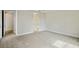 Comfortable bedroom featuring plush carpet and neutral wall paint at 3448 Yellow Leaf Cir, Spring Hill, FL 34609